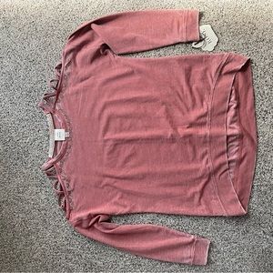 Dusty rose cold shoulder top with cute beading detail.